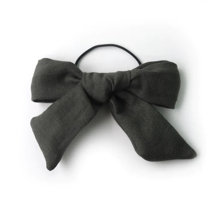Élastique avec une grosse boucle noir GIBOU. Montreal designer boutique.