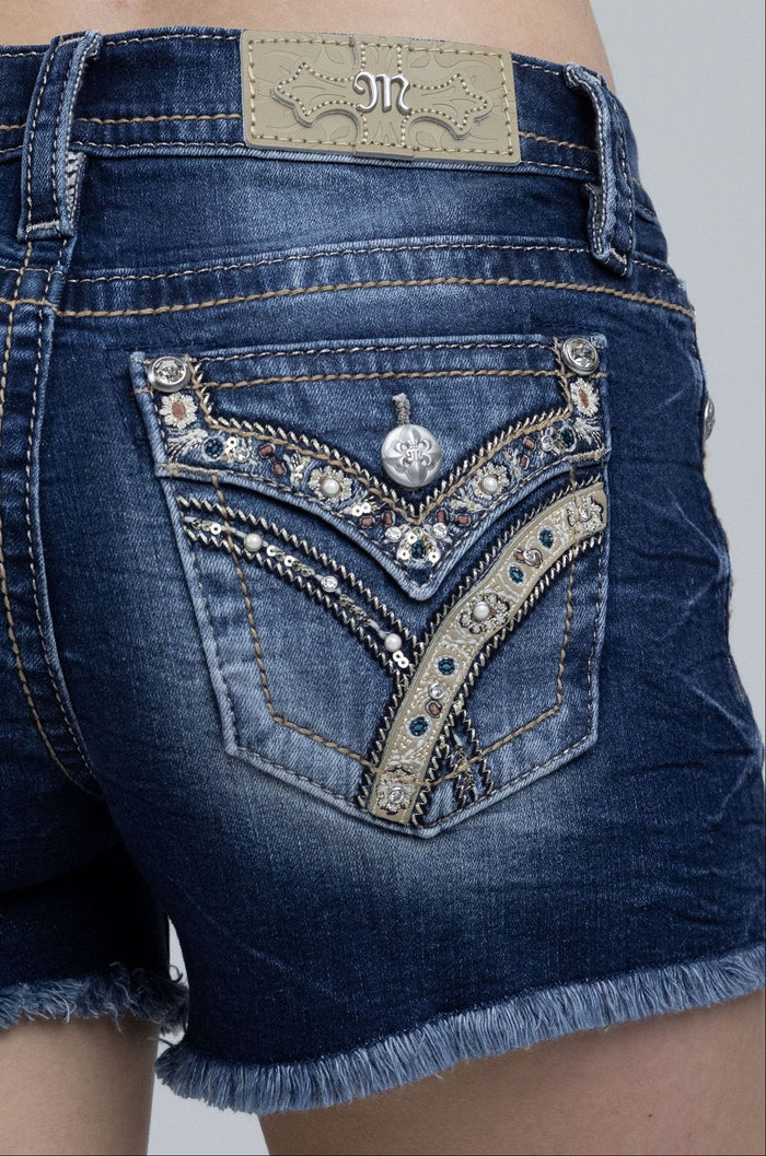 model wearing embellished shorts