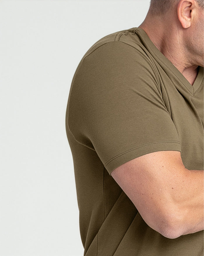 Military olive V-neck t-shirt with short sleeves shown on a male model from shoulder to mid-torso.