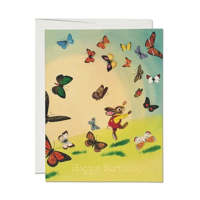 Greeting card with a rabbit and butterflies design, featuring the text 'Happy Birthday'.