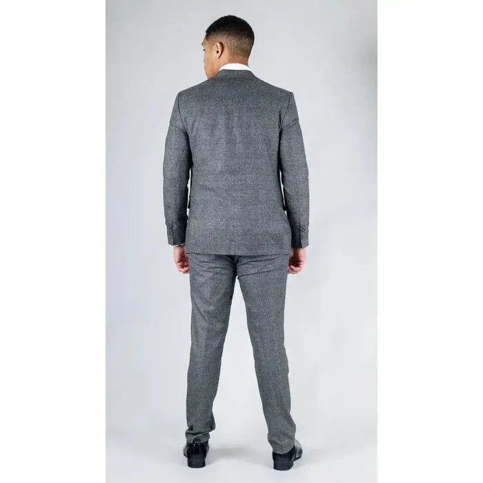 Back view of a men's grey checkered suit with matching trousers, tailored fit, worn with black dress shoes, suitable for formal occasions.