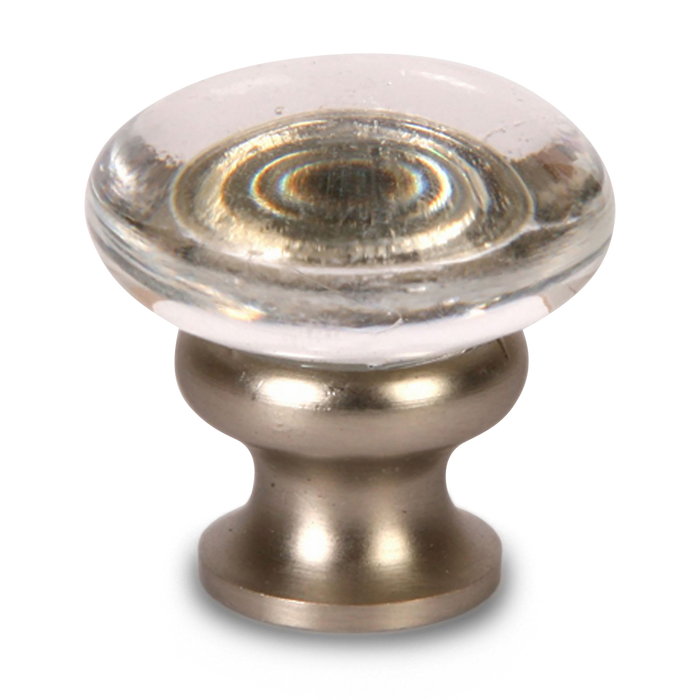 A petite, transitional knob with a clear oval shaped glass piece perched on an oil rubbed bronze base.