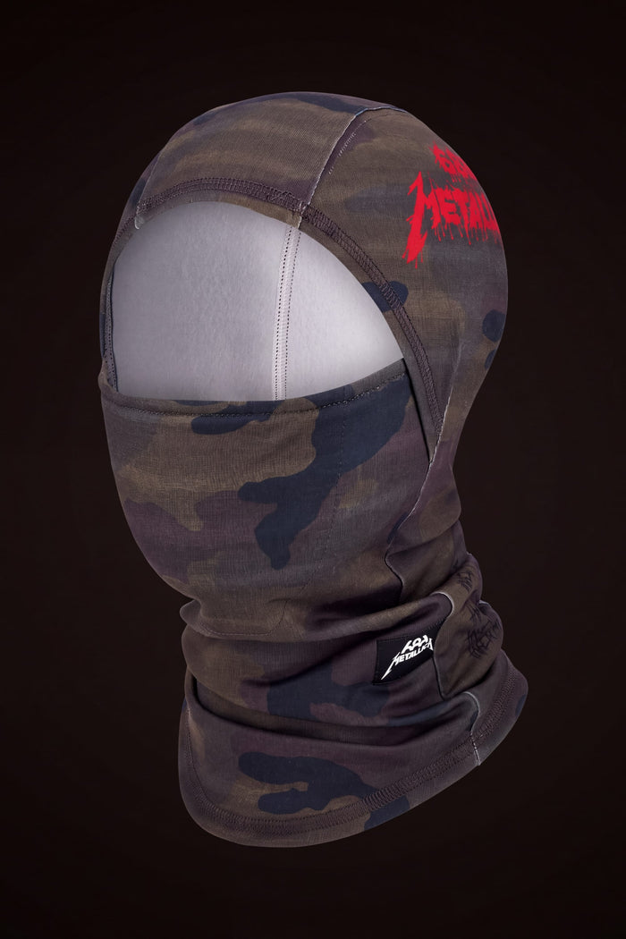 686 Hurra Hinged Balaclava in camo-print with a red Metallica logo on the forehead and a small logo tag at the neck.