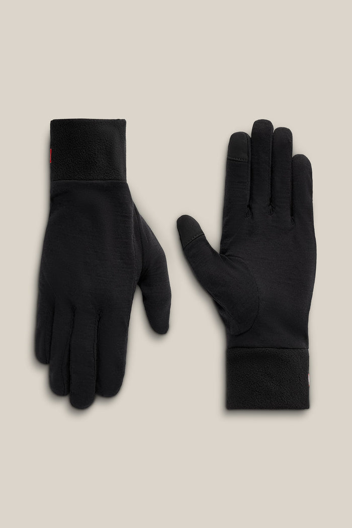 The 686 Men’s GORE-TEX® SMARTY® 3-In-1 Gauntlet Mitts by 686 are displayed on a beige background, with one mitt facing palm up and the other palm down.