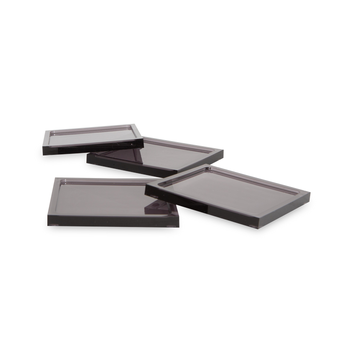 These acrylic coasters in a black finish offer a sleek way to protect your tabletops and keep your drinks in place.