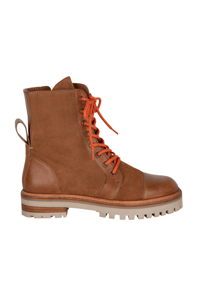 Brown boot with orange laces on a white background