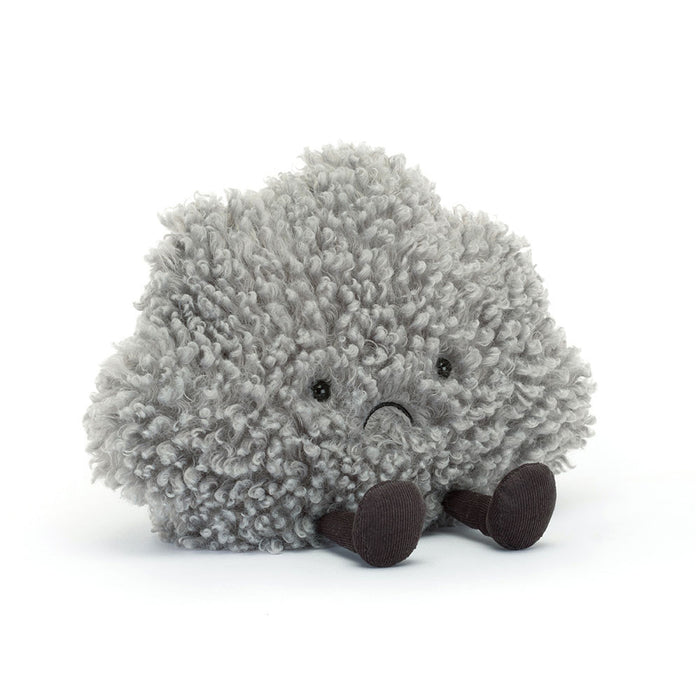 Plush toy grey cloud with a frowning face on a white background