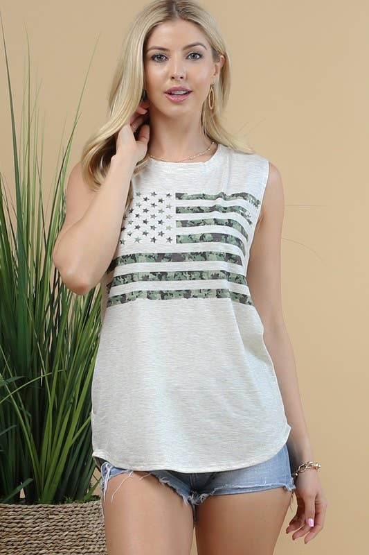Woman wearing a white sleeveless top with a camouflage design against a beige background