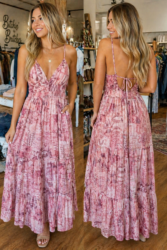 Woman wearing a pink floral dress in a store setting