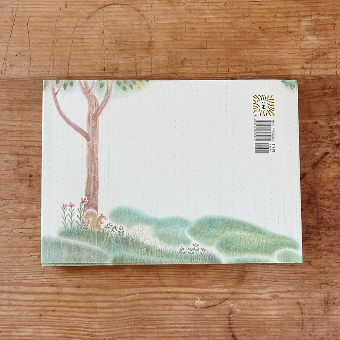 The back cover of the book with an illustration of a squirrel and a tree