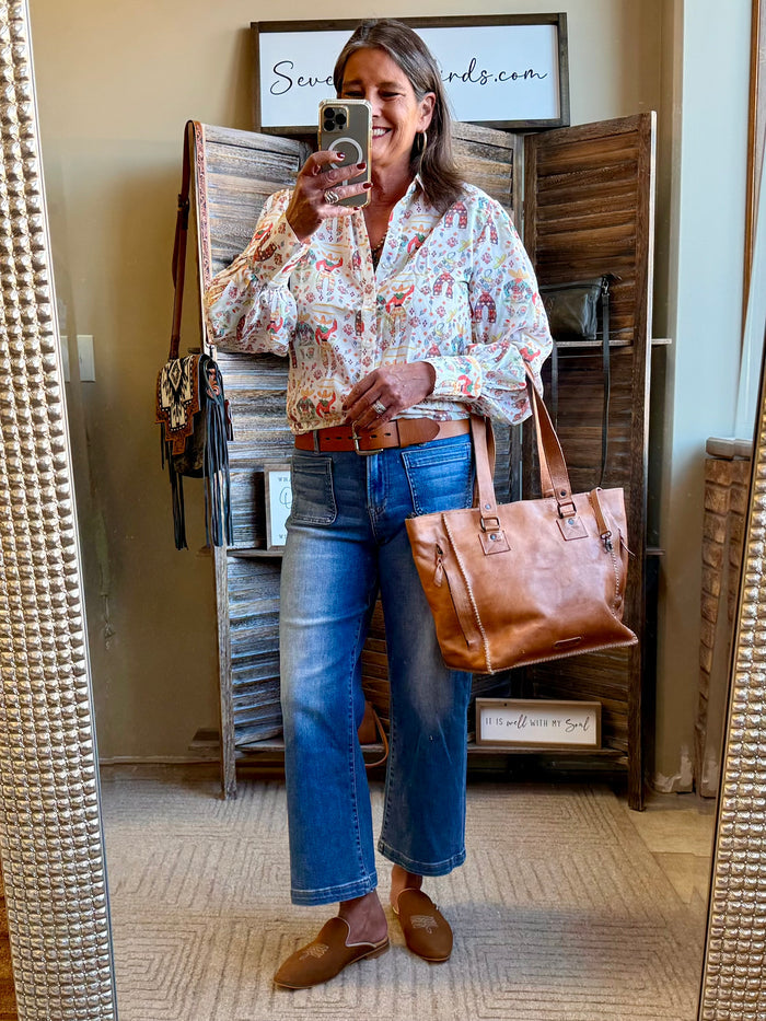 Women’s colorful cowboy blouse with puff sleeves and button-front closure