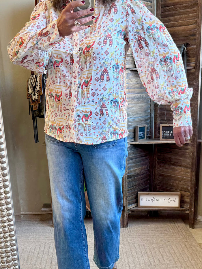 Women’s patterned cowboy blouse with long puff sleeves and button-down front