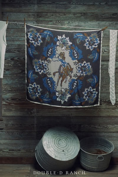 Damask silk scarf with blue floral pattern and central horse figure, square layout