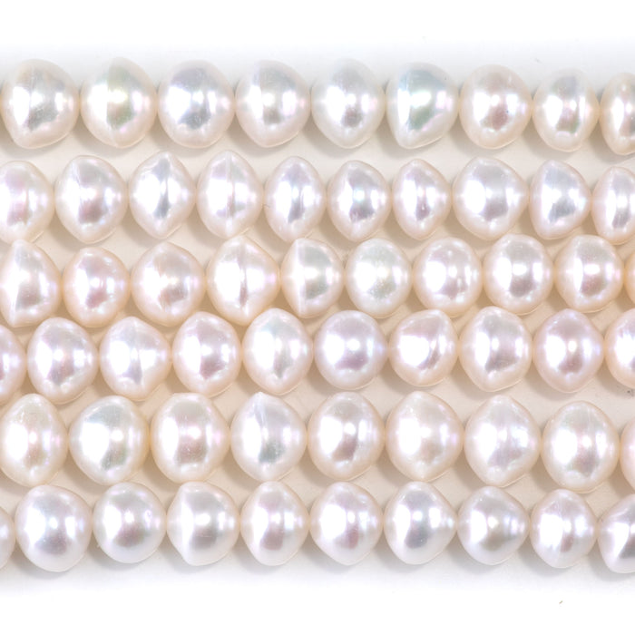 This is a Dakota Stones 7-9mm Freshwater Pearl White Potato Gemstone strand of round beads in 15-16 inch strand.
