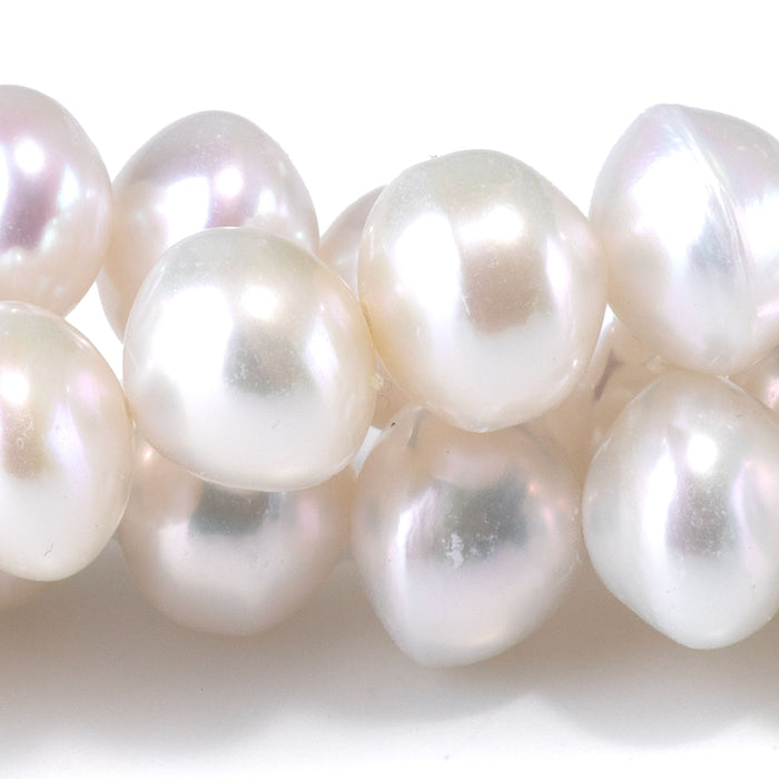 This is a Dakota Stones 7-9mm Freshwater Pearl White Potato Gemstone strand of round beads in 15-16 inch strand.