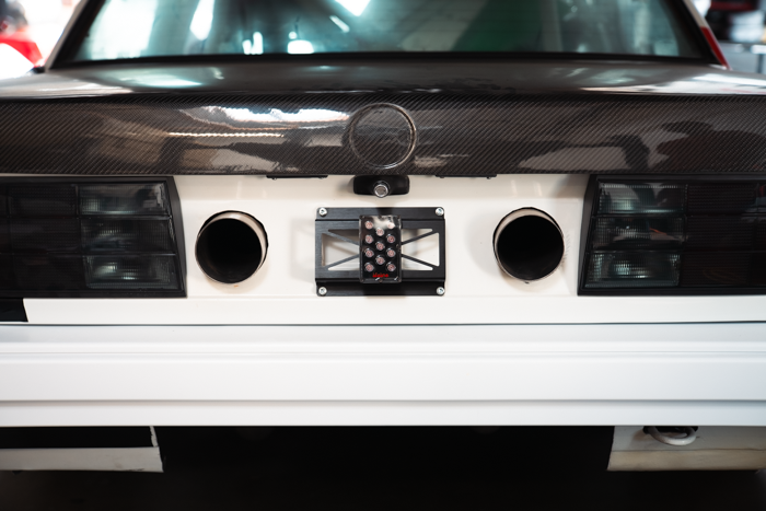 rain light bracket universal garagistic bmw e30 e36 license plate frame racecar track car