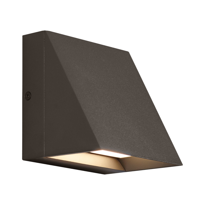 An architectural profile reminiscent of beautifully classic roof lines delivers significant light output in the Grove LED wall sconce which is suitable for both indoor and outdoor