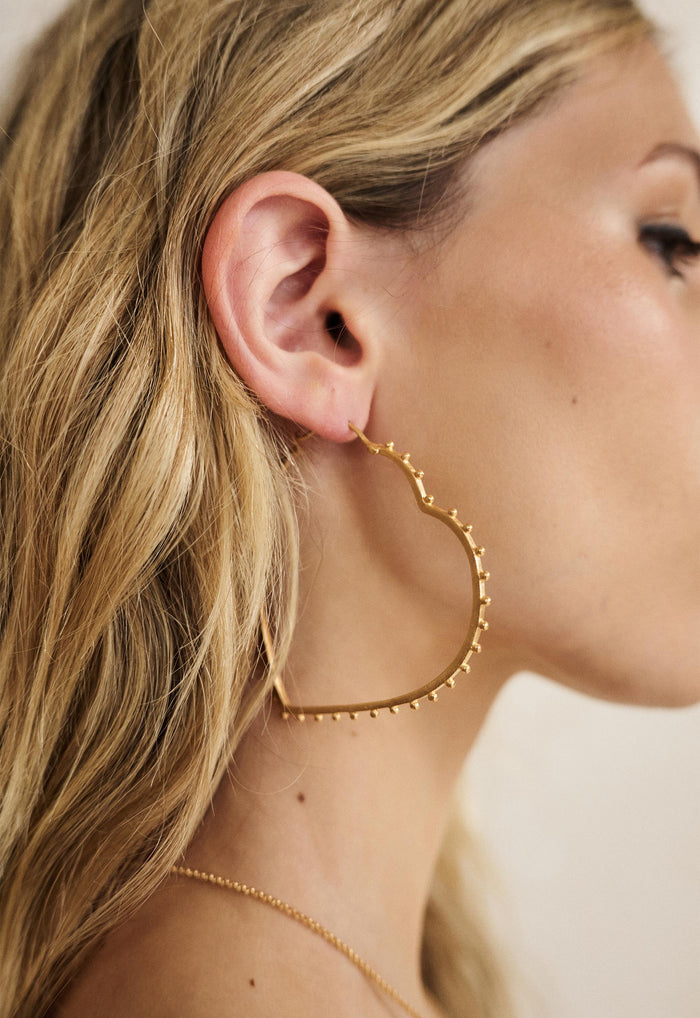Spell women's Heart Earrings in gold 22K-plated brass heart-shaped hoops with studded detail