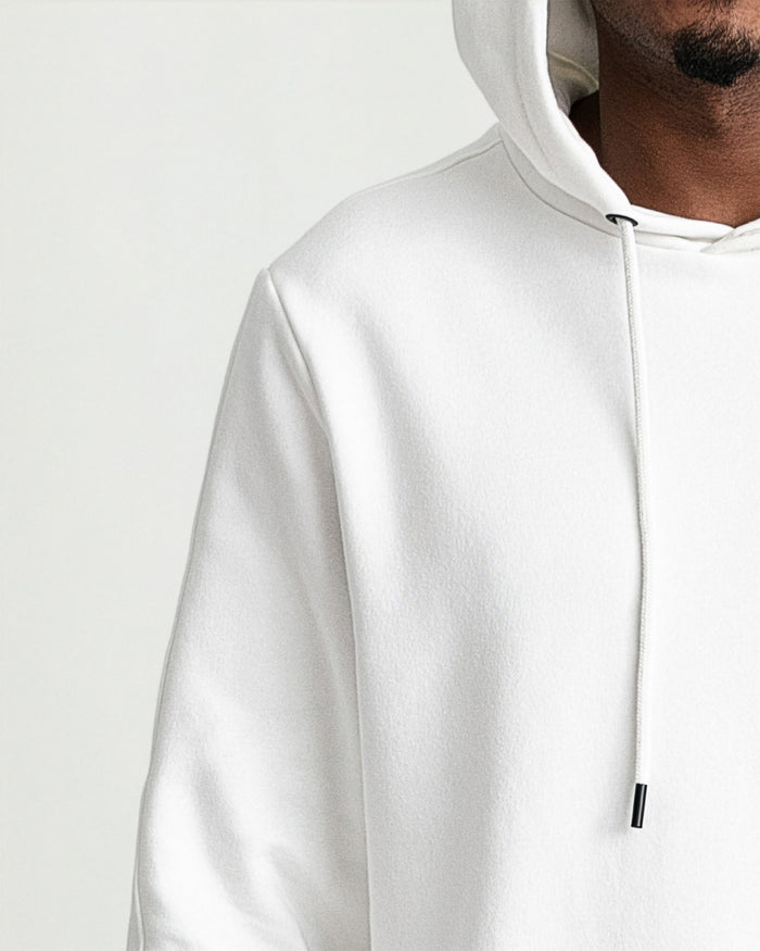 Natural cream-colored pullover hoodie with drawstring and kangaroo pocket on male model.