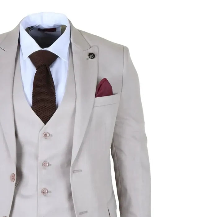 Men's beige 3-piece suit with notch lapel blazer, white dress shirt, brown knitted tie, burgundy pocket square, and matching vest, tailored for formal occasions.