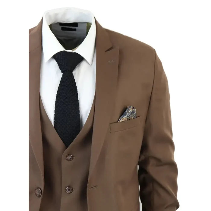 Detailed shot of men's brown 3-piece suit with blazer, vest, white shirt, black tie, and pocket square, suitable for professional settings.