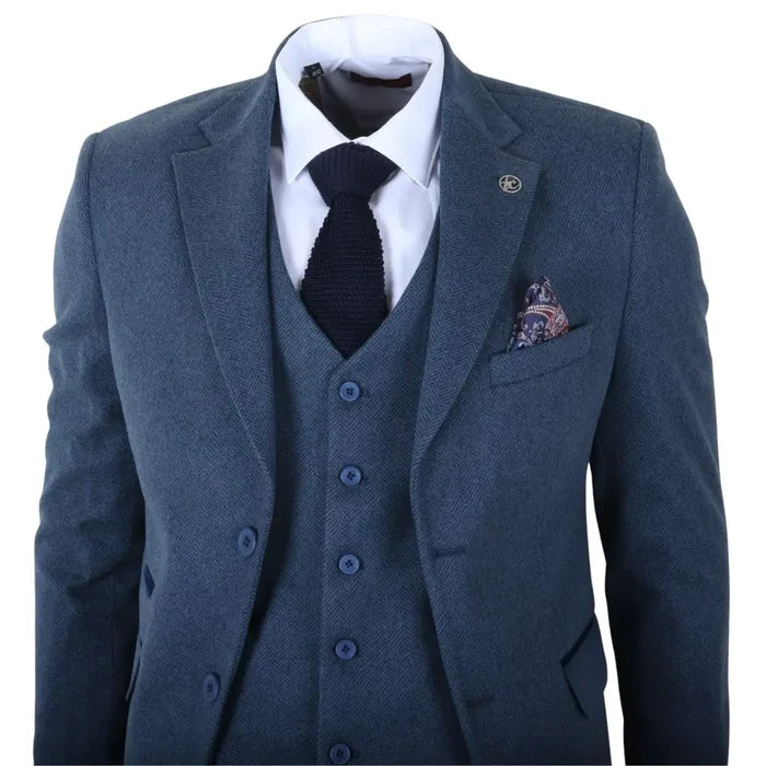 Men's blue tweed suit with jacket, waistcoat, and trousers, styled with a white shirt and dark tie, on a mannequin, SKU: IM40_suit_Blue_34