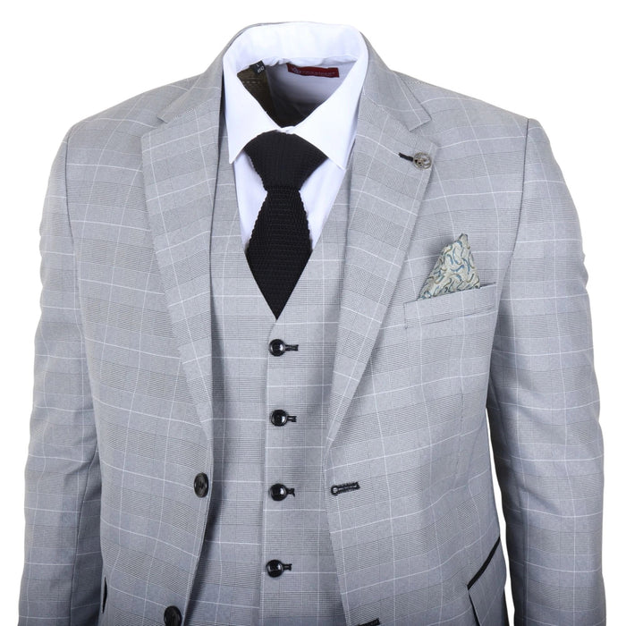 Front view of men's grey check tailored suit with white dress shirt, black knitted tie, and decorative lapel pin, SKU: IM53_suit_Grey_34