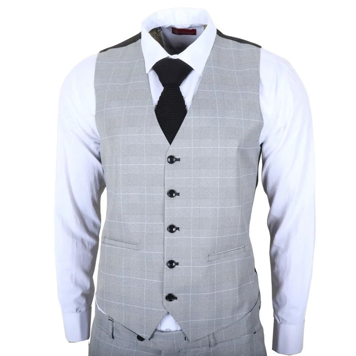 Men's grey check 3-piece tailored fit suit with a white dress shirt and black knit tie, featuring a modern structured silhouette and subtle plaid pattern