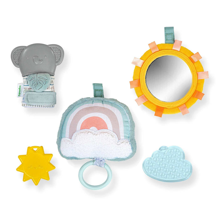 Calm Springs Soothing Essentials gift set with musical plush toy, teething mitt, sun mirror, and teethers for newborns