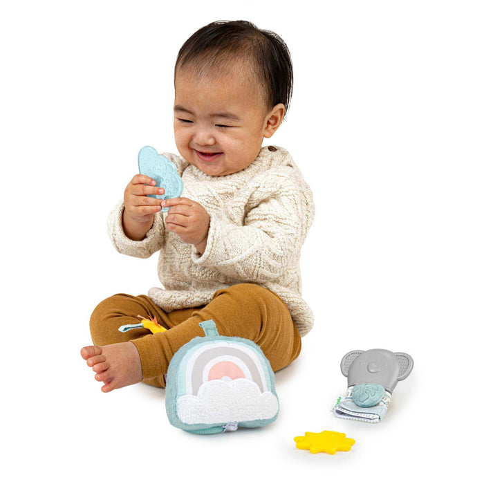 Ingenuity Calm Springs Soothing Essentials Gift Set with musical plush, teething mitt, sun mirror, and teethers for newborns