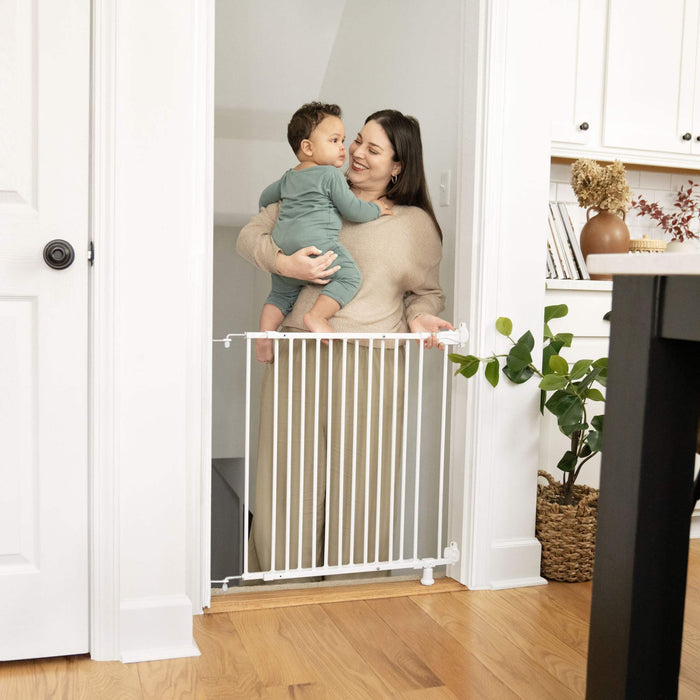 Summer by Ingenuity The Stairway 42W Series white metal safety gate installed at top of stairs