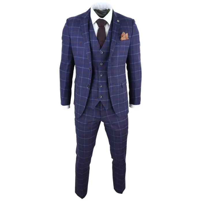 Close-up of men's navy blue checkered suit with blazer, waistcoat, and matching trousers, featuring contrasting lining and pocket square