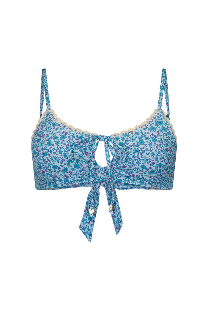 Blue Nirvana floral bikini top, front view, crochet-edge neckline, centre keyhole with tie detail, heart charm accents