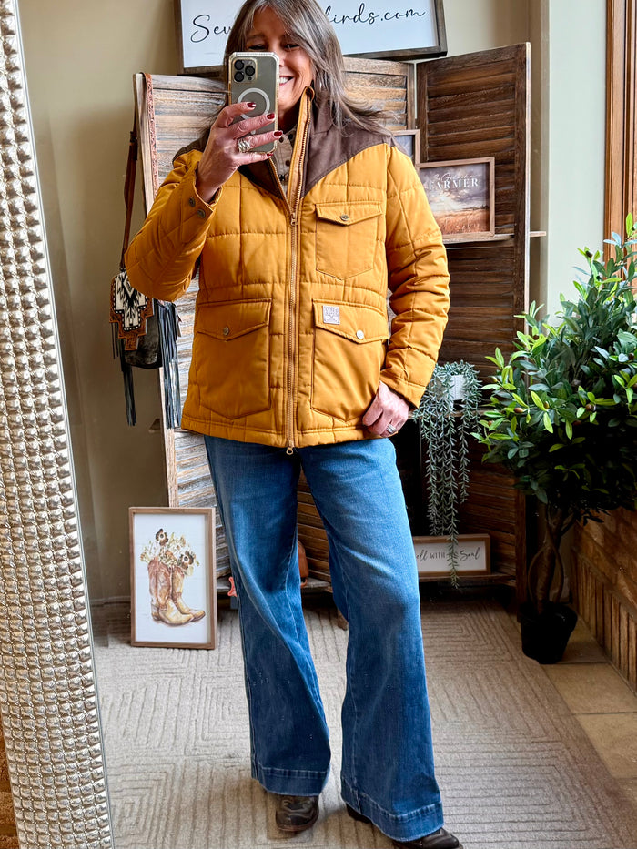 Mustard quilted zip-up coat with two chest patch pockets and zip front
