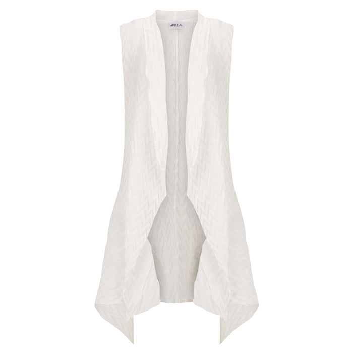 White sleeveless top with a subtle pattern on a white background