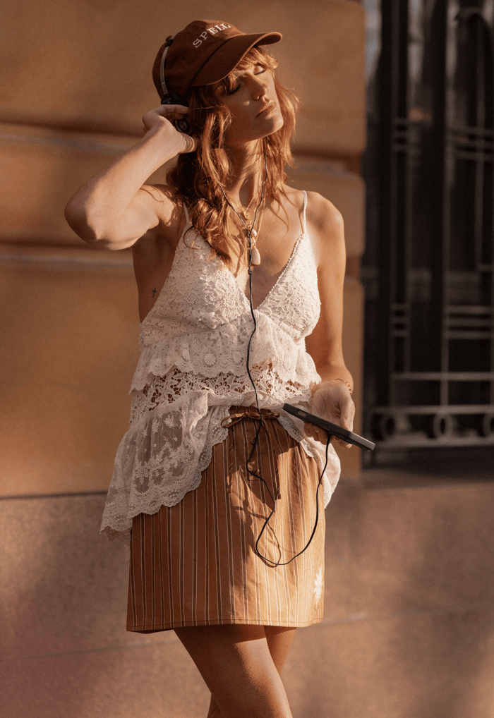 Off Duty Mini Skirt in Caramel Cafe, caramel stripe organic cotton, front button placket and waist tie detail