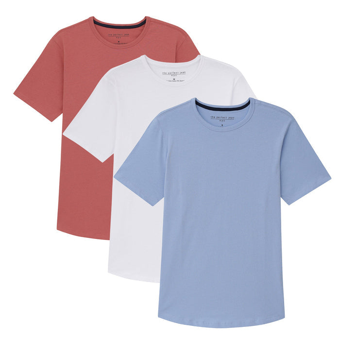 Three crew neck t-shirts in rust red, white, and blue displayed layered together.