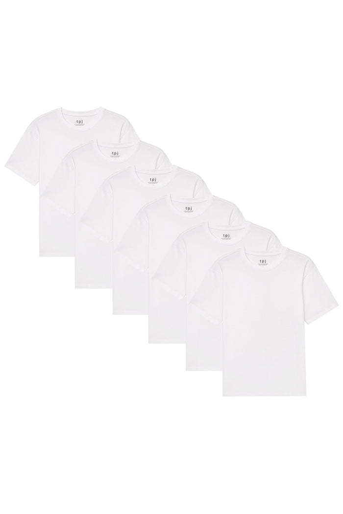 Six white crew neck t-shirts with small brand labels displayed in staggered rows.