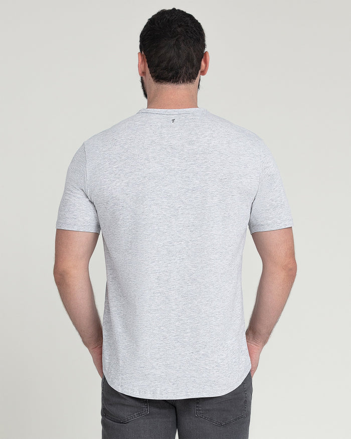 Man wearing heather grey crew neck t-shirt with short sleeves, shown from back view.