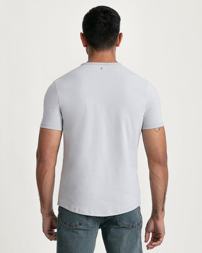 Light grey crew neck t-shirt worn by man shown from back view.