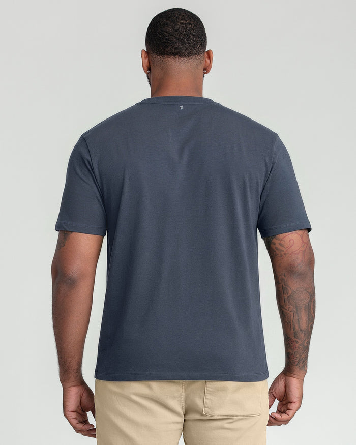 Steel gray crew neck t-shirt worn by a man, shown from the back.