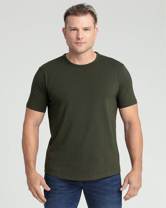 Olive crew neck t-shirt with short sleeves on a model wearing dark jeans.