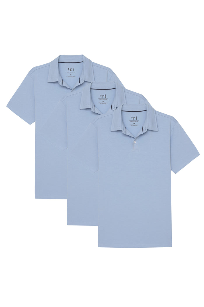 Three light blue polo shirts with collars, short sleeves, and chest pockets, displayed overlapping.