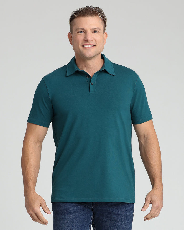 Man wearing teal polo shirt with collar and button front, paired with dark jeans.