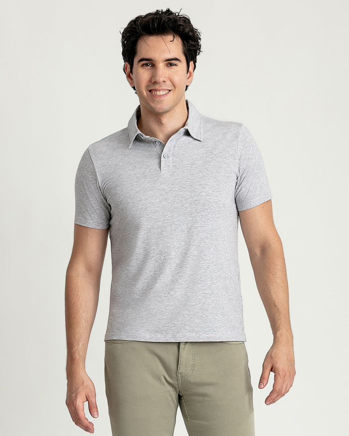 Man wearing light gray short-sleeve polo shirt with collar and button front.