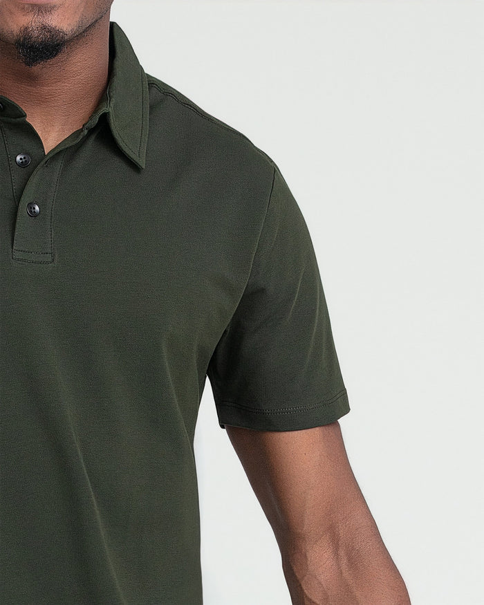 Olive green polo shirt with collar and button placket shown on male model.
