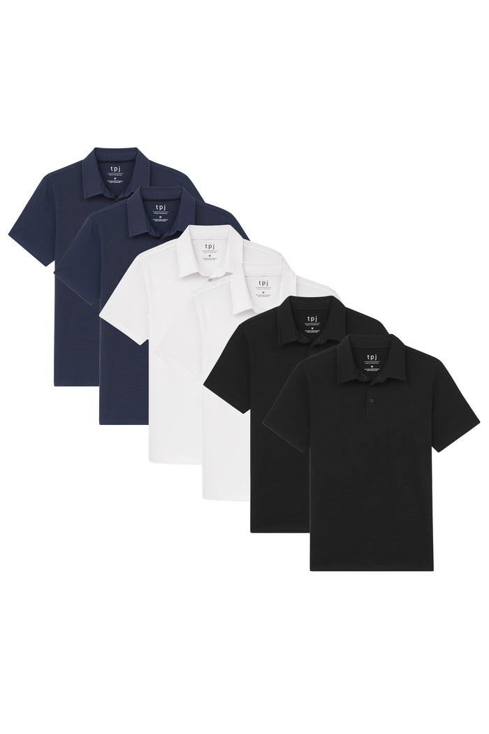 Six polo shirts in navy, white, and black with short sleeves and collars, arranged in overlapping rows.