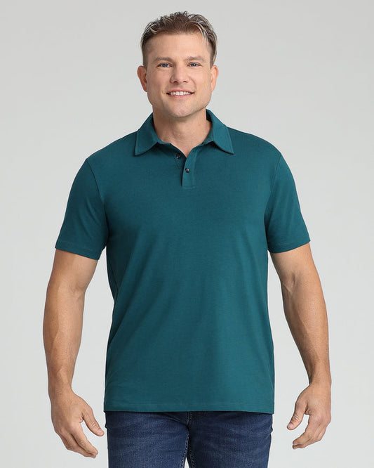 Teal polo shirt with collar and button placket worn by man on neutral background.