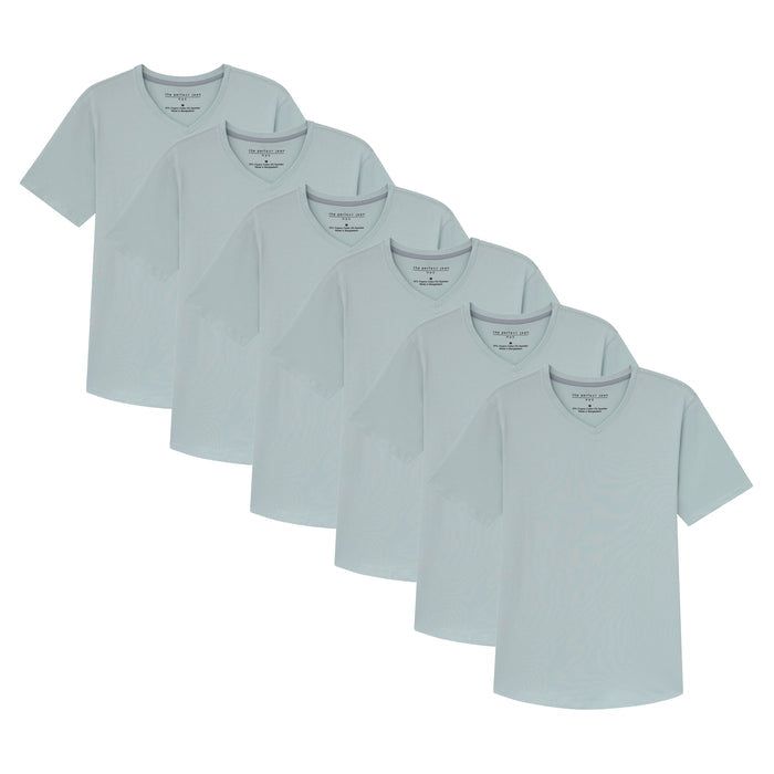 Six mint green v-neck t-shirts arranged in overlapping rows.