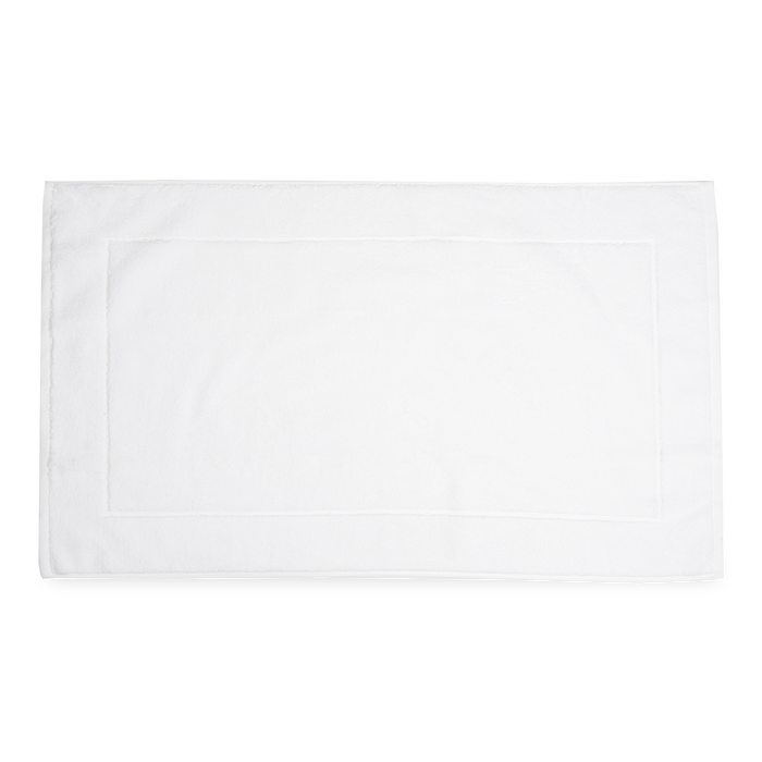 The Sarma Tab Mat uses a dreamy color palette that is woven with simple finished hems for a clean, modern look.